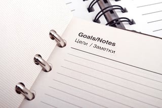 writing down goals to beat debt
